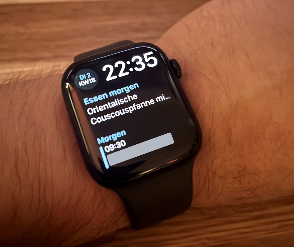 Picture of a wrist wearing an Apple Watch: The watch shows the meal for tomorrow